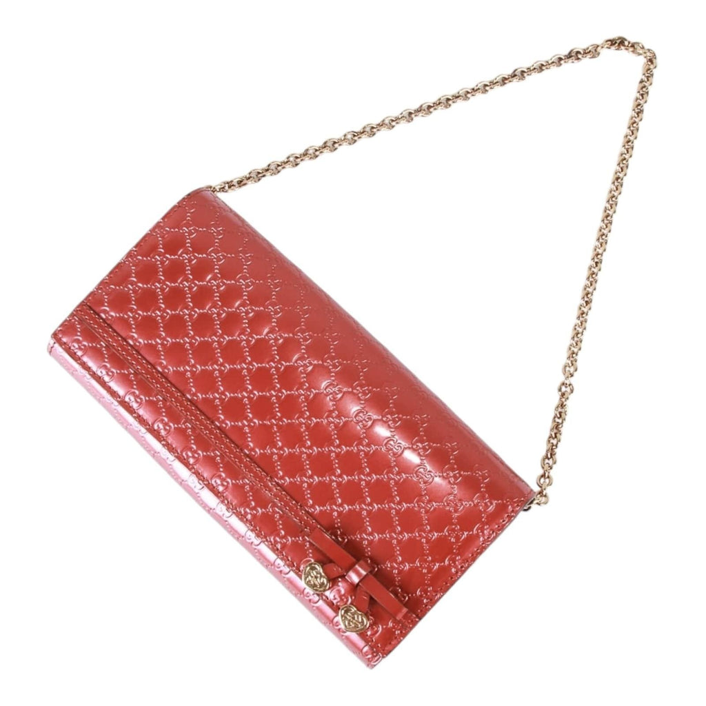 Gucci Guccissima heart bow chain clutch