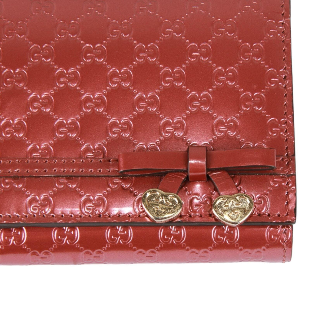 Gucci Guccissima heart bow chain clutch