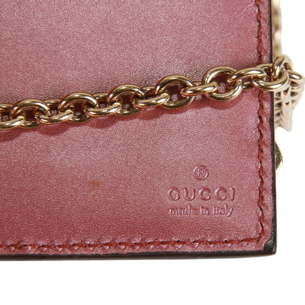 Gucci Guccissima heart bow chain clutch