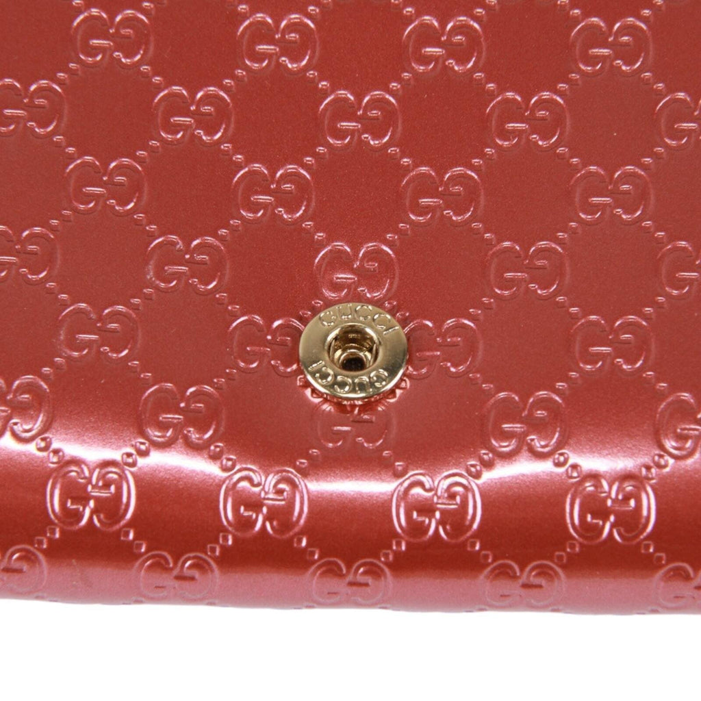 Gucci Guccissima heart bow chain clutch