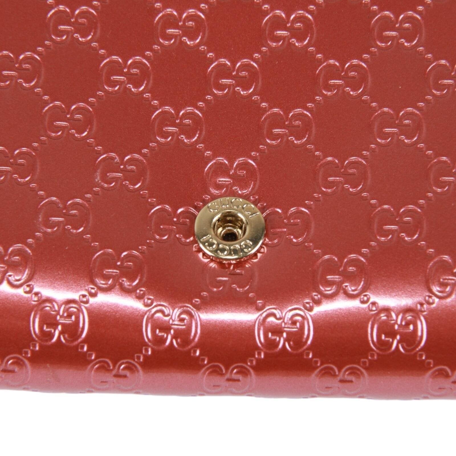 Gucci Guccissima heart bow chain clutch
