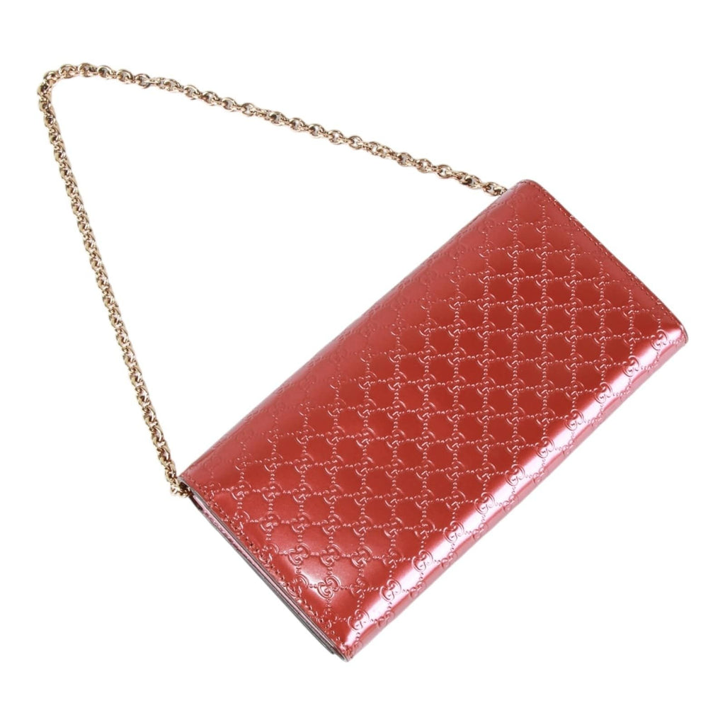 Gucci Guccissima heart bow chain clutch