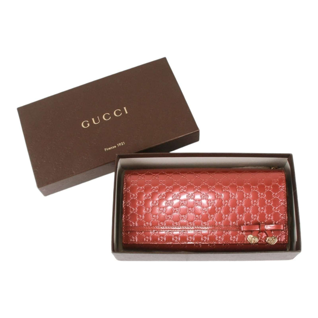 Gucci Guccissima heart bow chain clutch
