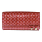 Guccissima heart bow chain clutch