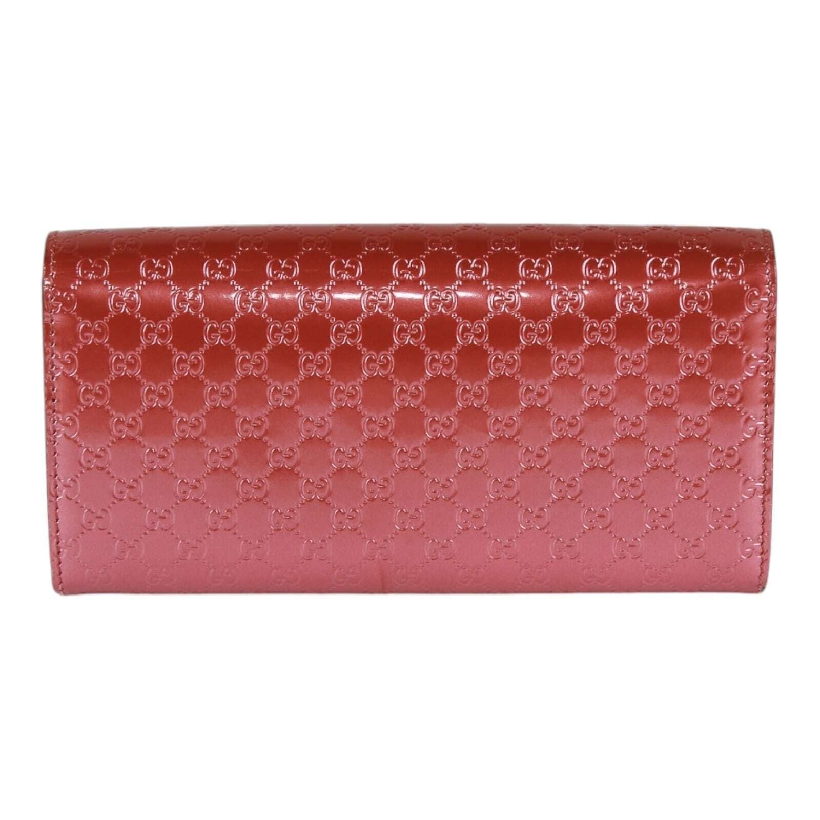 Gucci Guccissima heart bow chain clutch
